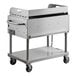 A Backyard Pro stainless steel liquid propane grill with griddle on wheels.