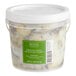 A container of Sevillo Fine Foods Fire Roasted Whole Artichoke Hearts with a white lid.
