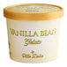 A white container of Villa Dolce vanilla bean gelato with a yellow lid.