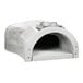A white stone Chicago Brick Oven wood-fired pizza oven kit with a round hole.