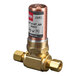 A brass Oatey AA Tee Hammer Arrestor with a red and black label.