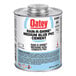 A 32 oz. can of Oatey Rain-R-Shine medium blue PVC cement with a white label.