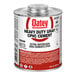 A can of Oatey heavy-duty gray CPVC cement with a red label.