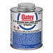 A can of Oatey PVC bonding adhesive on a counter.