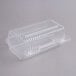 A Durable Packaging clear hinged lid plastic container.
