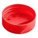 A 53/485 red plastic bottle cap with dual flappers and 3 holes.