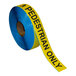 A roll of blue and yellow Superior Mark "Pedestrian Only" safety tape.