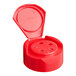 A red plastic spice lid with 5 holes.