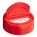 A red plastic spice lid with a white heat induction liner inside.