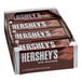 A close-up of a HERSHEY'S Milk Chocolate Bar.