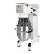 A white Varimixer commercial planetary mixer with a round metal bowl.