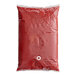 A red plastic bag with a white logo for Red Gold Tomato Ketchup.