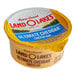 A yellow Land O Lakes Ultimate Cheddar Cheese Dip container with a label.