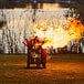 A Nuke BBQ Fogon portable wood fire pit burning a fire.