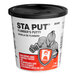 A white container of Hercules Sta Put Plumber's Putty with a black lid.