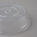 A clear plastic Cambro Camcover with a circular hole.