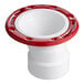 A white and red Oatey PVC pipe fitting with a red rim.
