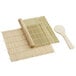 A bamboo sushi mat next to a bamboo rice paddle.