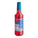 A red plastic Torani Sugar-Free Cherry Flavoring Syrup bottle with a blue label.