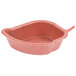 A red plastic bowl with a handle.