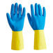 A pair of blue and yellow rubber gloves, one blue and one yellow.