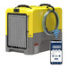 A yellow and grey AlorAir Storm Extreme LGR 85 dehumidifier with a wire wrapped around it.