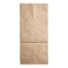 A Duro natural kraft paper lawn and leaf bag with a crease.