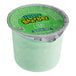 A Luigi's lime sherbet ice cup in a green container.
