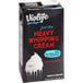 A black carton of Violife plant-based heavy cream with white and red text.
