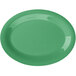 A rainforest green oval melamine platter with a white border.