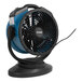 A blue and black XPOWER Portable Cooling Misting Fan with a cord attached.
