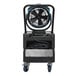 An XPOWER white and black misting fan on a cart.