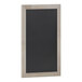 A black chalkboard with a wooden frame.