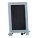 A Flash Furniture rustic blue wooden tabletop chalkboard with a chalkboard in a wooden frame.