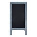 A Flash Furniture vintage blue wooden A-frame chalkboard with a blackboard on it.