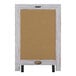 A white and brown wooden Flash Furniture tabletop chalkboard with a black metal frame and metal scrolled legs.