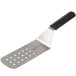 A Mercer Culinary Millennia perforated turner with a stainless steel blade and white handle.