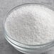 A bowl of Regal Sodium Benzoate white powder.