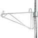 A chrome Metro wall mount shelf support pole with a metal rod on it.