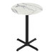 A white marble Holland Bar Stool EuroSlim bar height table with a black base.