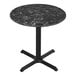 A Holland Bar Stool EuroSlim black marble table top on a metal cross base.