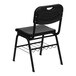 A black Flash Furniture plastic chair with a wire rack on the back.