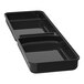 A black Delfin divided durable ABS market tray on a counter.