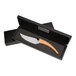 A Laguiole Le Buron cheese knife with an olivewood handle in a black box.