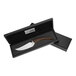 A Laguiole Le Buron cheese knife with a rosewood handle in a black box.