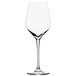 A close-up of a Stolzle Exquisit Royal white wine glass with a long stem.