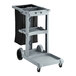A Lavex gray janitor cart with a black bag.