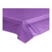 A purple Choice plastic tablecloth on a white table.