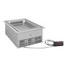 A silver rectangular Hatco drop-in induction food well with a black cord.