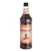 A Monin Maple Pumpkin Cold Brew Coffee 7:1 Concentrate bottle on a white background.